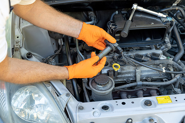 How Mechanics Track An Engine Misfire To A Spark Plug Or Ignition Coil | Gil's Garage Inc